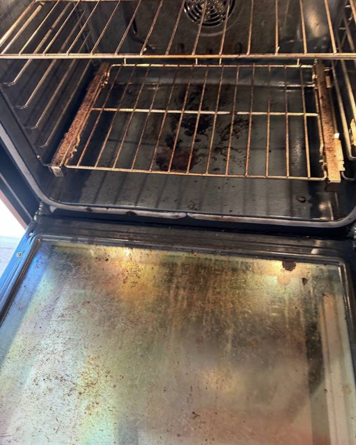 Before: greasy oven interior and stained door glass